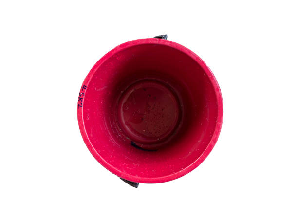Red plastic bucket for cleaning isolated on a white background