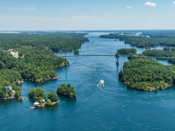 Boats, docks, small islands, trees-Thousand Islands