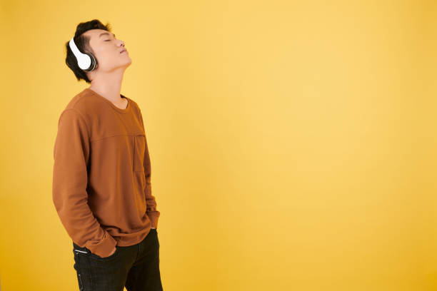 istock Man Enjoying Favorite Song 1413667418
