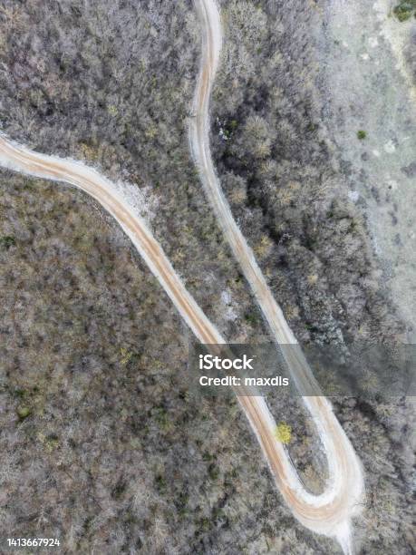 Topdown View Of An Hairpin Bend In The Middle Of A Forest Stock Photo - Download Image Now