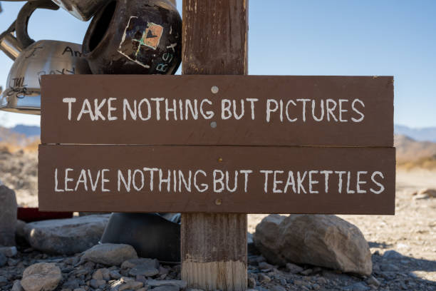 Take Nothing But Pictures Sign At Teakettle Junction Death Valley National Park United States: February 18, 2021: Take Nothing But Pictures Sign At Teakettle Junction in Death Valley National Park teakettle junction stock pictures, royalty-free photos & images