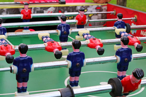 istock Foosball game. Red and blue team players. 1413672133