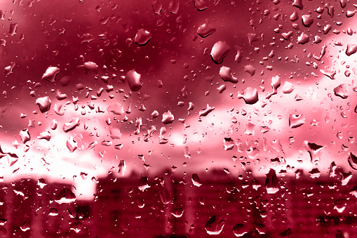 Close-up raindrops on the car window background