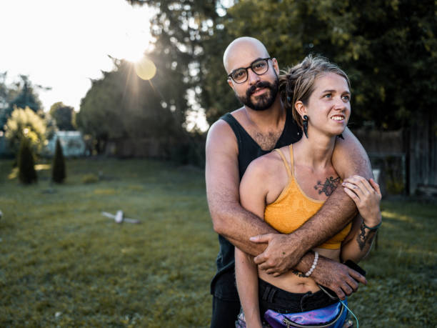 istock Artist couple taking a break from creating mural 1413679946