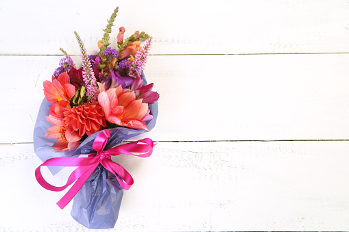 spring flowers in bucket on white  background