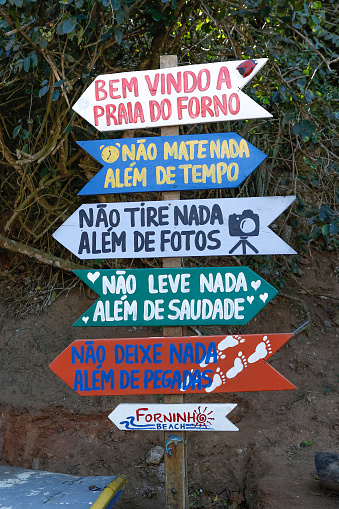 Signs at the beach in Armacao dos Buzios, Rio de Janeiro, Brazil