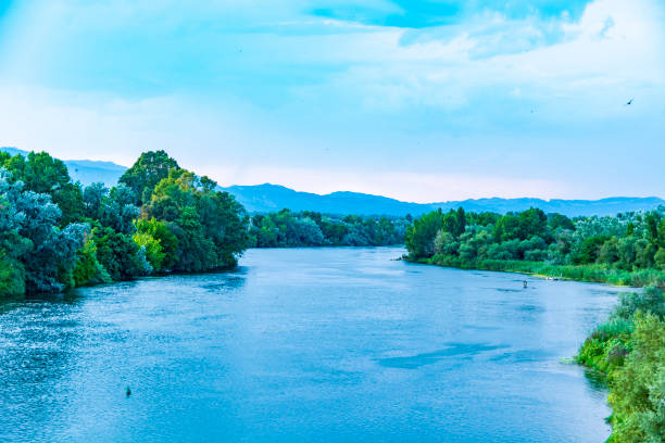 Ebro river valley in Tortosa, Catalonia, Spain in late evening light on summer day