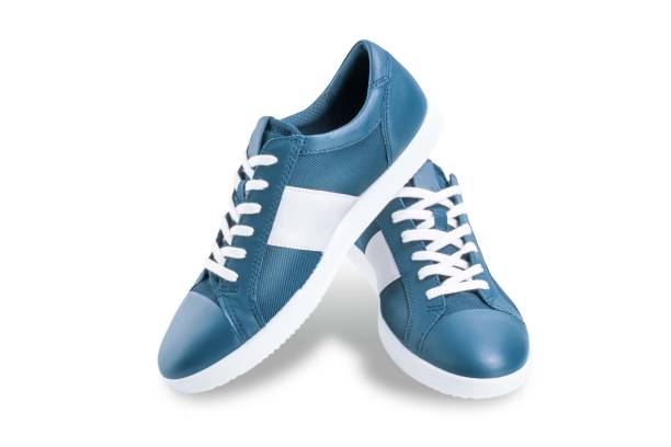 istock Blue sneakers on a white isolated background 1413685126
