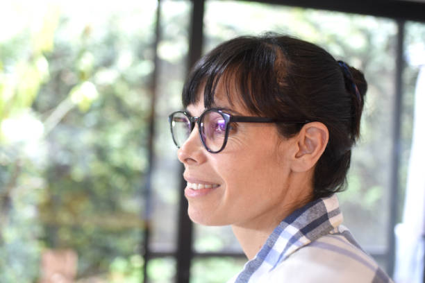 istock woman with glasses 1413693503