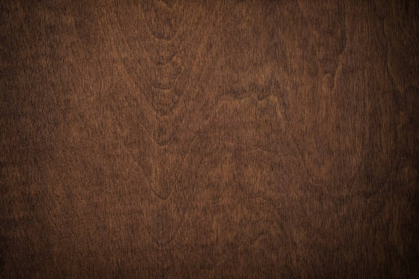 istock dark wood grain, brown board with a natural pattern. wooden background 1413695384