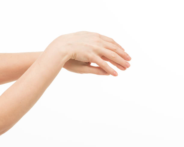 female hands do massage, touch each other, stroke each other on a white background isolated stock photo
