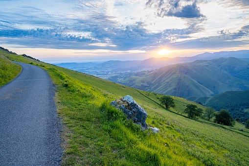 Mountain road at sunrise in the Pyrenees on the Camino de Santiago.