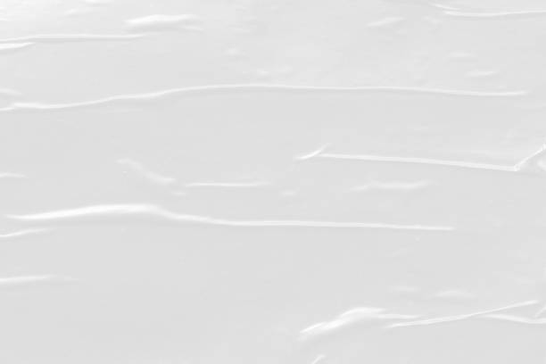 istock white crumpled and creased plastic poster texture background 1413704643