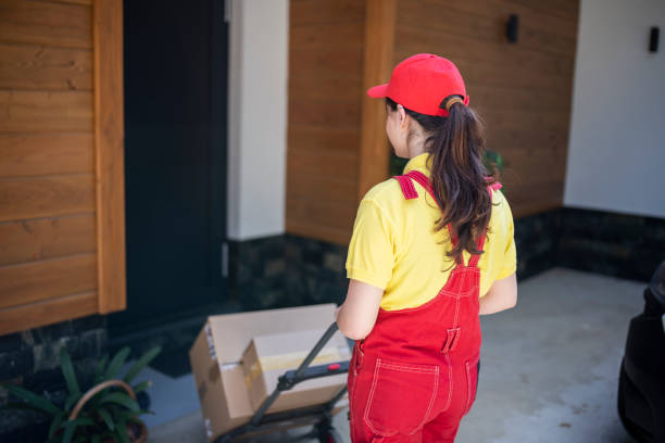 istock Courier delivering packages to the door. 1413704866