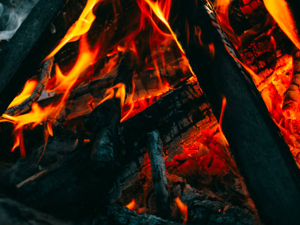 istock Burning campfire. Bonfire close up. Autumn relax camping mood 1413711293