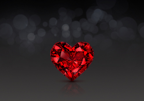 Red heart shaped diamond, bokeh background