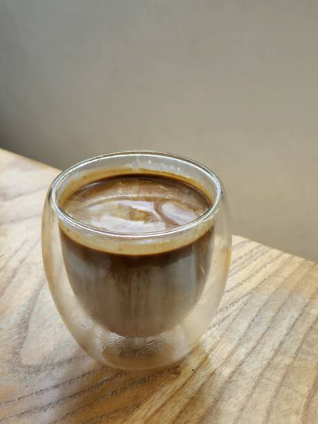 istock Nice cold dirty coffee shot with light shading moment. 1413713549