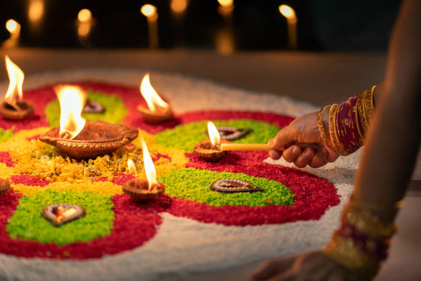 istock Traditional diya lamps lit during diwali celebration 1413721980