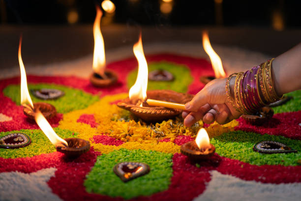 istock Traditional diya lamps lit during diwali celebration 1413721987