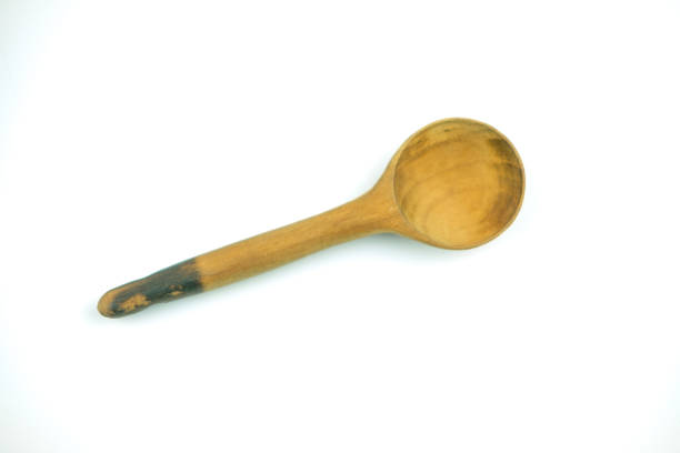 istock Old wooden spoon on a white background 1413722171
