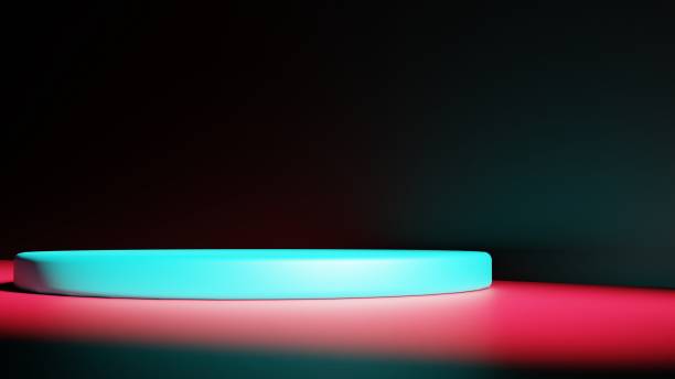 istock 3D rendering. 3d illustration. Blue platform on pink floor in a dark room with a light on the right side. 1413723719