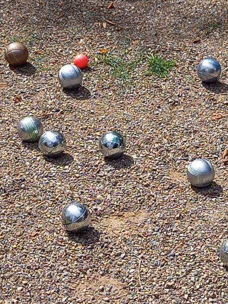 istock Playing Boule on a place with gravel stone 1413728883