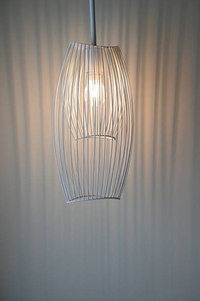 istock luxury lamp hanging on room with white curtain 1413730713