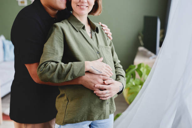 istock Young Lesbian Couple Expecting Baby 1413731371