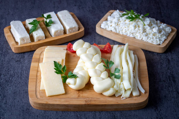 istock Traditional various cheeses, string, knitted and cecil cheese, turkish delicatessen concept 1413731995