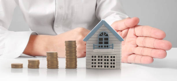 istock House Residential Structure in  hand 1413732139