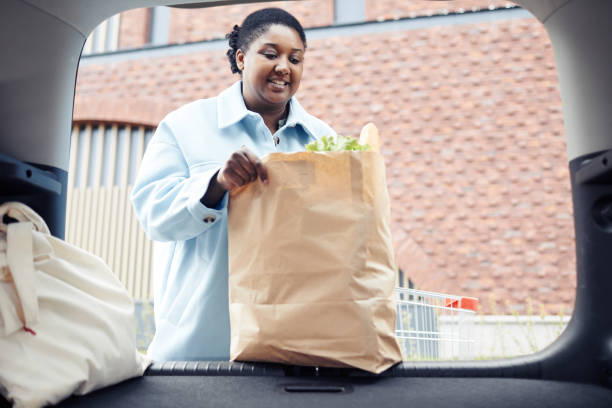 istock Putting Groceries in Car 1413732191