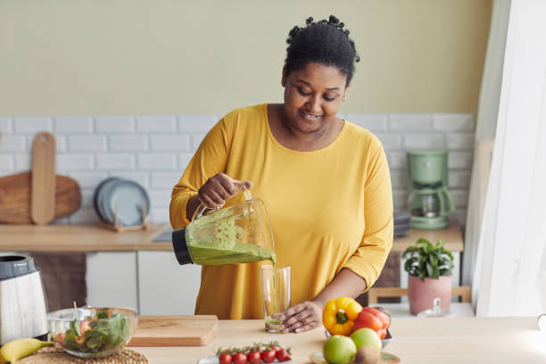 Overweight Woman Enjoying Healthy Smoothie
