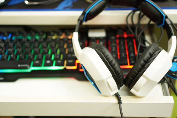 istock E-sports equipment: headphones and keyboards, close-up. 1413733718