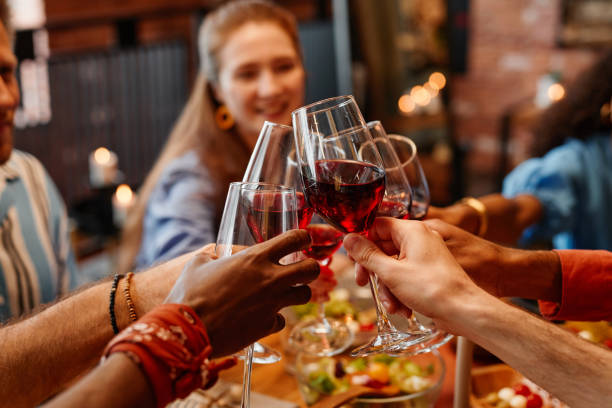istock Group of People at Dinner Party 1413738177