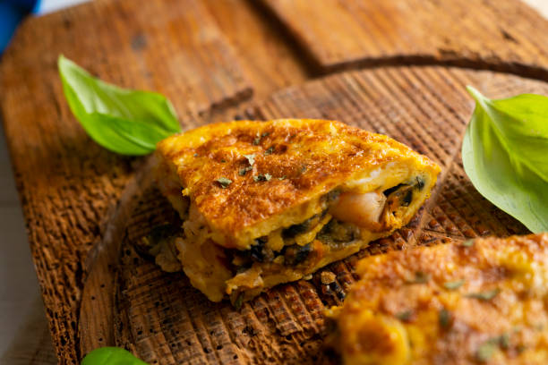 istock Spanish omelette with mussels and prawns. 1413739328