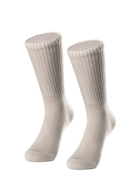 istock Long beige socks on a white insulated background 1413740237