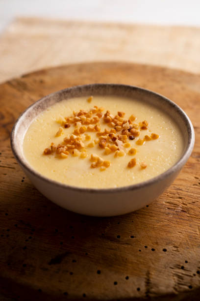 istock Custard with milk cream and almond crocant. 1413740285