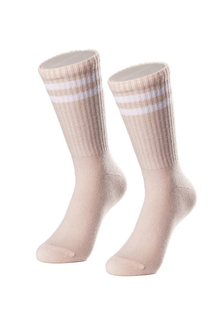 istock Long beige socks on a white insulated background 1413740516