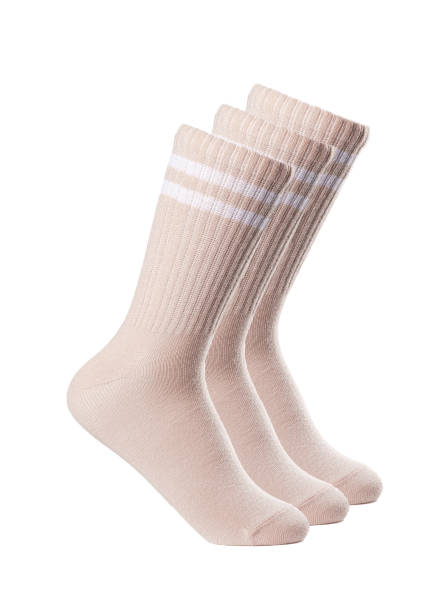 istock Long beige socks on a white insulated background 1413740526