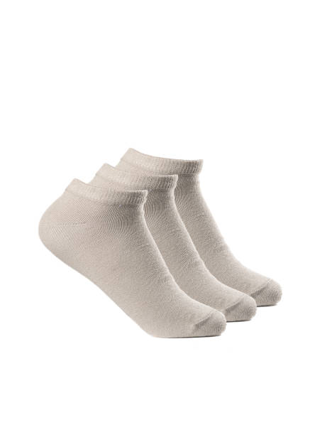 istock Short beige socks on a white insulated background 1413740557