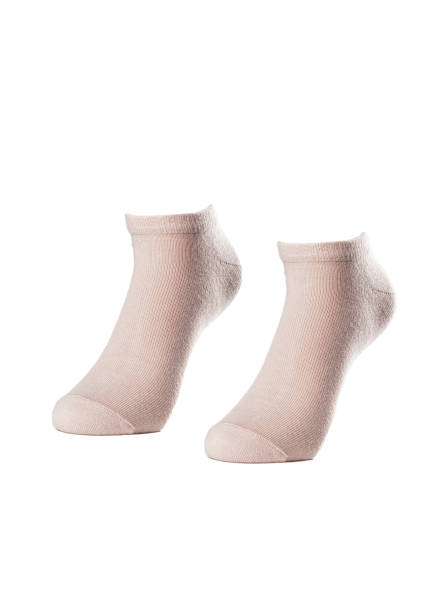istock Short beige socks on a white insulated background 1413740618