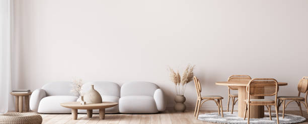 минималистичный современный дизайн дома с теплыми цветами мебели, макет рамы плаката на ярком фоне интерьера - living room contemporary home interior showcase interior стоковые фото и изображения