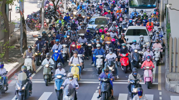 istock Crowded of scooter and car 1413753091
