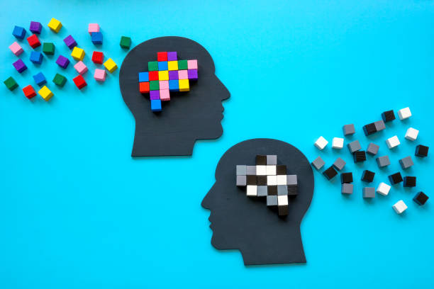 istock Positive and negative mindset concept. Heads with colorful cubes. 1413754507
