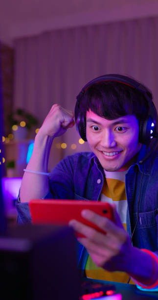 istock esport gamer plays mobile game 1413754732