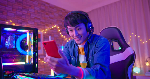 istock esport gamer plays mobile game 1413754805