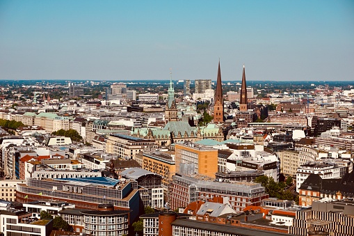 Panoramic view of Hamburg. The whole Gaiburg is at a glance. Aged photos in the style of the 60-80s of the last century. Hamburg on a sunny day from a bird's-eye view. Summer Hamburg. View of Hamburg from St. Michael's Church.