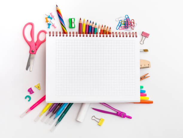 istock Blank notebook with School office supplies on a desk with copy space. 1413762915