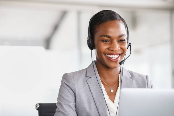 Customer service woman working on a phone call stock photo