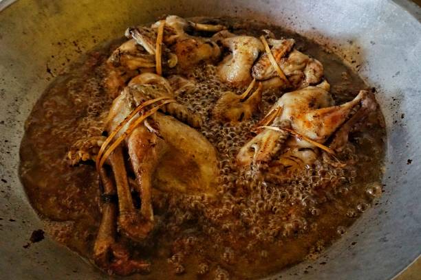 istock chicken fried in hot oil 1413763651